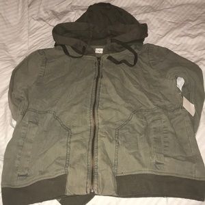 Olive denim hooded jacket is faded.